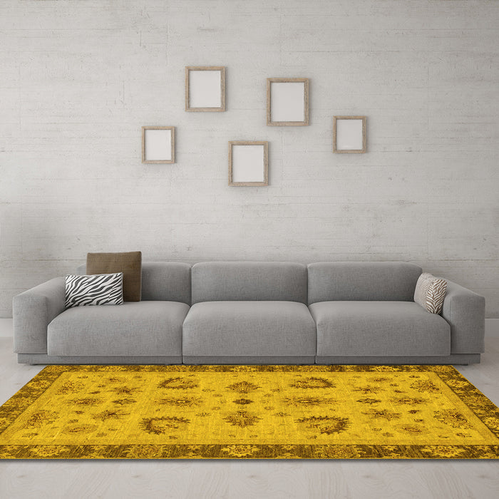 Machine Washable Oriental Yellow Traditional Rug in a Living Room, wshabs3609yw