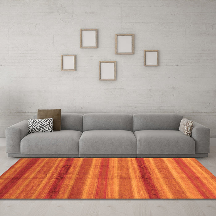 Machine Washable Abstract Orange Modern Area Rugs in a Living Room, wshabs3668org