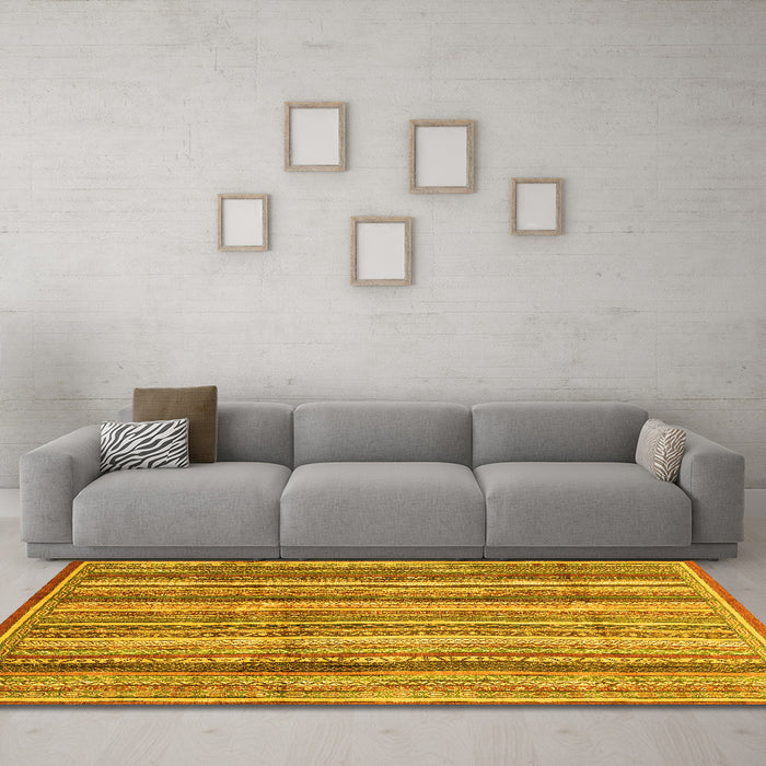 Machine Washable Abstract Yellow Modern Rug in a Living Room, wshabs3686yw