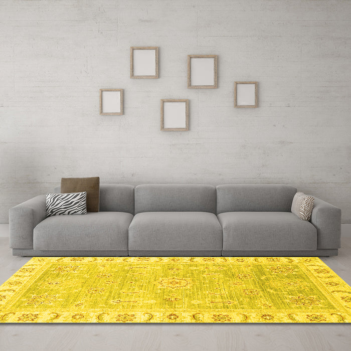 Machine Washable Oriental Yellow Traditional Rug in a Living Room, wshabs3711yw