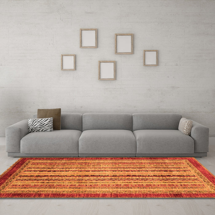 Machine Washable Abstract Orange Modern Area Rugs in a Living Room, wshabs3751org