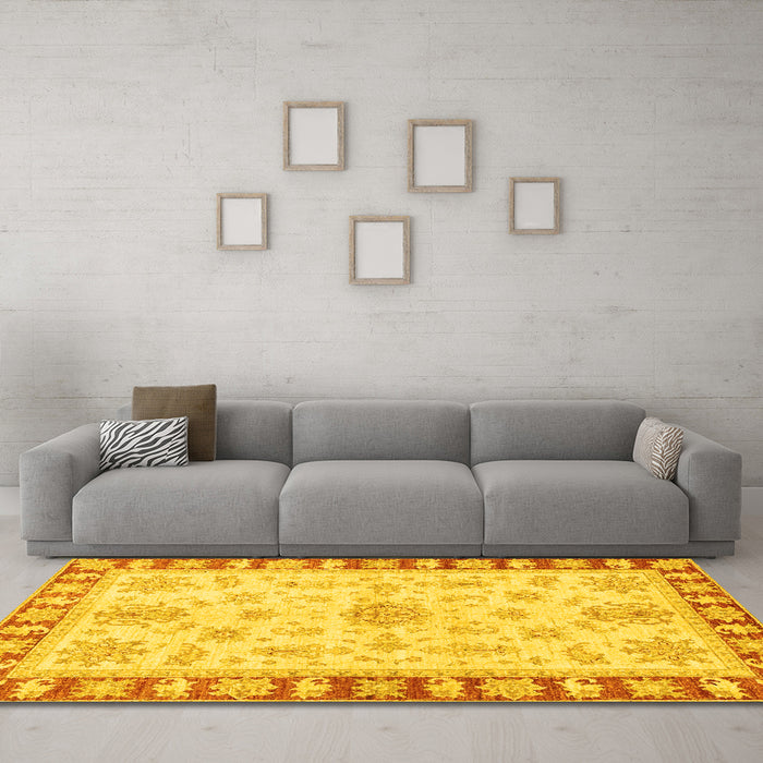 Machine Washable Oriental Yellow Traditional Rug in a Living Room, wshabs3926yw
