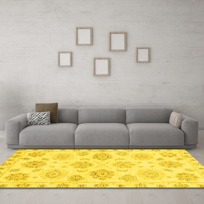 Machine Washable Oriental Yellow Traditional Rug in a Living Room, wshabs3942yw
