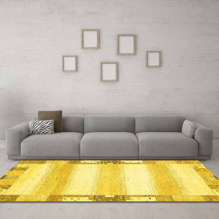 Machine Washable Solid Yellow Modern Rug in a Living Room, wshabs398yw