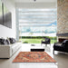 Square Abstract Red Persian Rug in a Living Room, abs4009