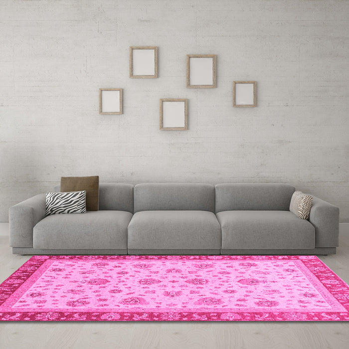 Machine Washable Oriental Pink Traditional Rug in a Living Room, wshabs4057pnk