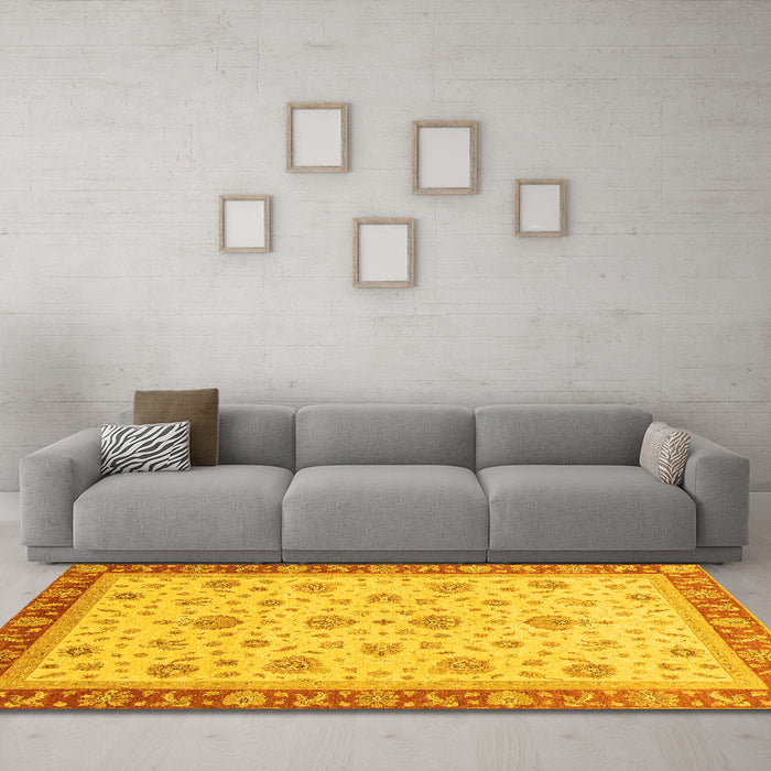 Machine Washable Oriental Yellow Traditional Rug in a Living Room, wshabs4057yw