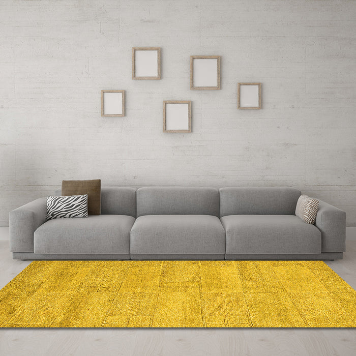 Machine Washable Solid Yellow Modern Rug in a Living Room, wshabs4122yw