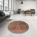 Round Abstract Brown Red Oriental Rug in a Office, abs4139