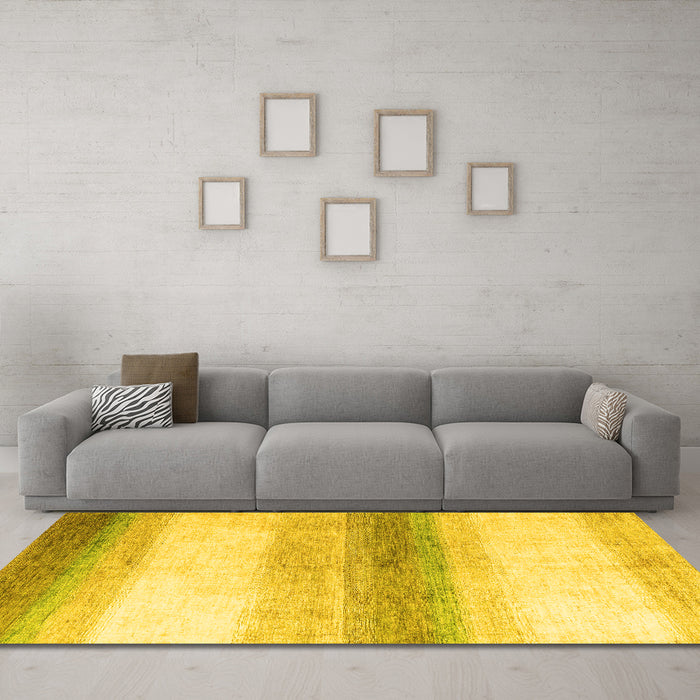 Machine Washable Solid Yellow Modern Rug in a Living Room, wshabs4228yw
