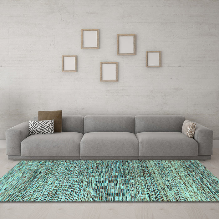 Machine Washable Oriental Light Blue Modern Rug in a Living Room, wshabs4257lblu