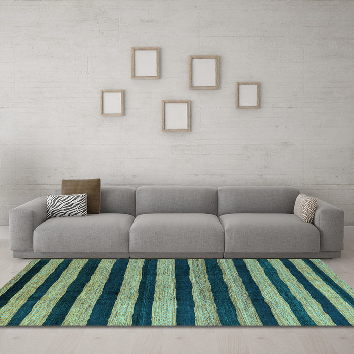 Machine Washable Oriental Light Blue Modern Rug in a Living Room, wshabs4259lblu