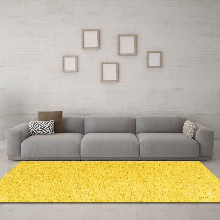 Machine Washable Solid Yellow Modern Rug in a Living Room, wshabs4298yw