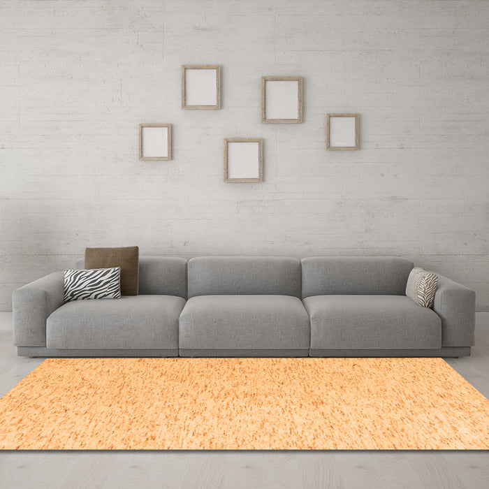 Machine Washable Solid Orange Modern Area Rugs in a Living Room, wshabs4298org