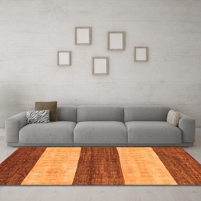 Machine Washable Abstract Orange Modern Area Rugs in a Living Room, wshabs42org