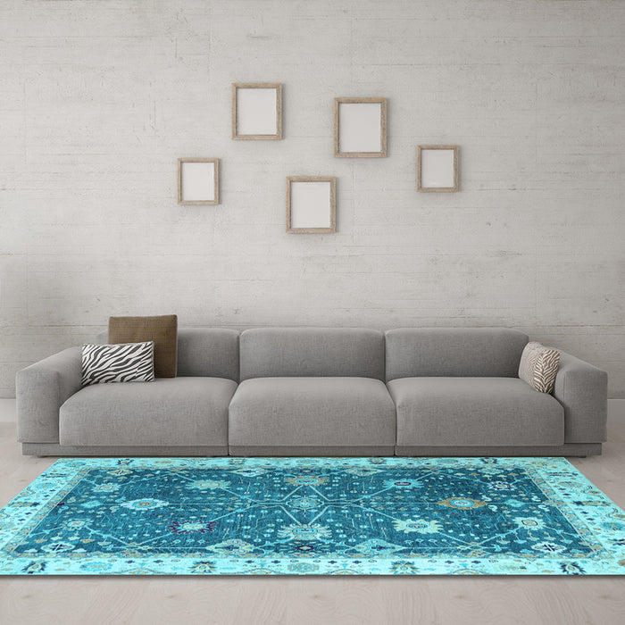 Machine Washable Oriental Light Blue Traditional Rug in a Living Room, wshabs4310lblu