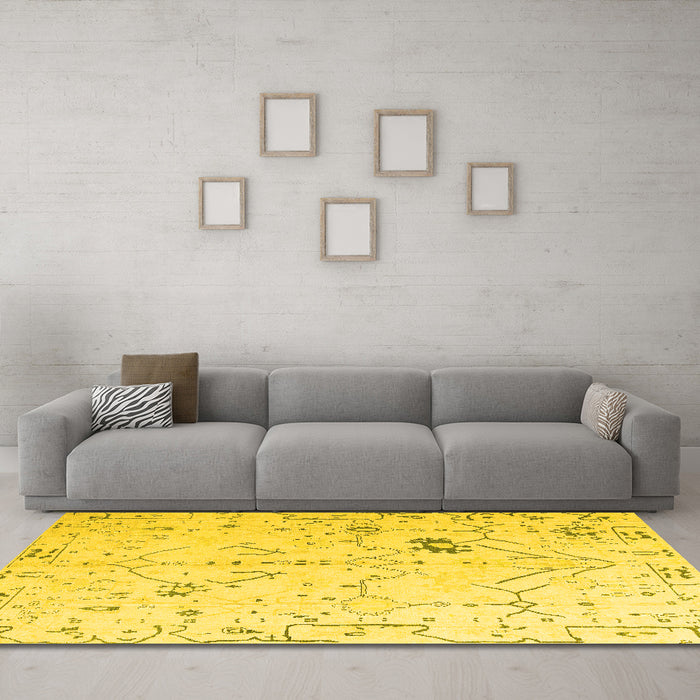 Machine Washable Solid Yellow Modern Rug in a Living Room, wshabs4314yw
