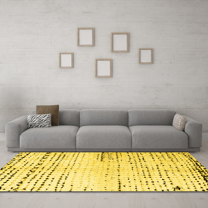 Machine Washable Solid Yellow Modern Rug in a Living Room, wshabs4385yw
