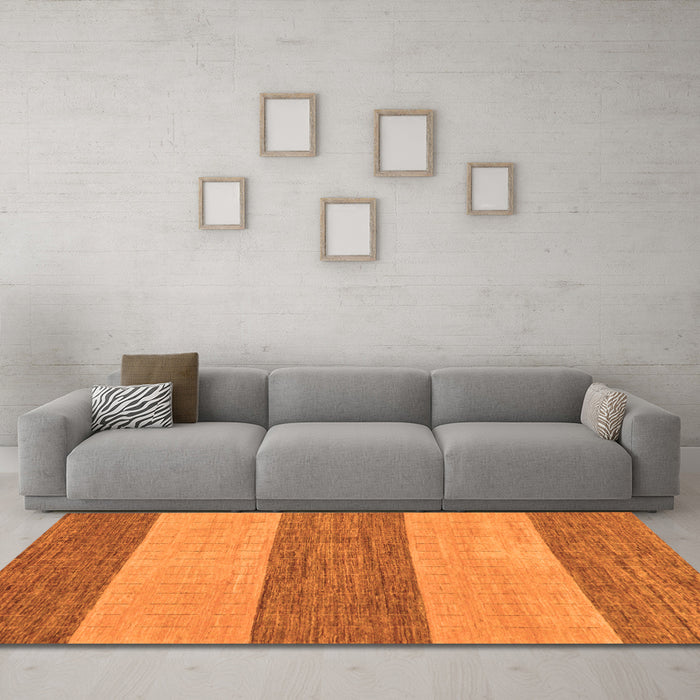 Machine Washable Abstract Orange Modern Area Rugs in a Living Room, wshabs43org