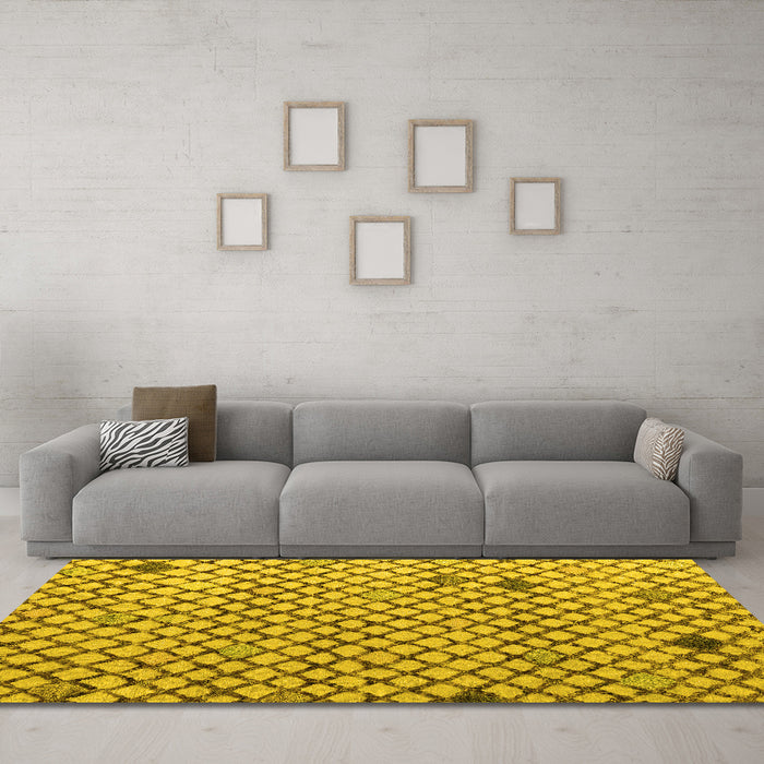 Machine Washable Solid Yellow Modern Rug in a Living Room, wshabs4456yw