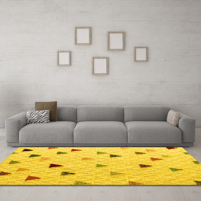 Machine Washable Solid Yellow Modern Rug in a Living Room, wshabs4462yw