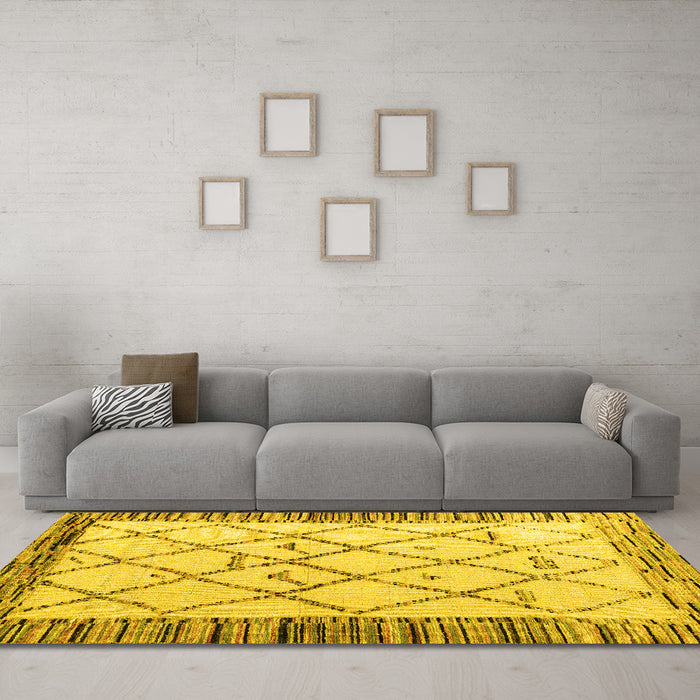 Machine Washable Solid Yellow Modern Rug in a Living Room, wshabs4464yw