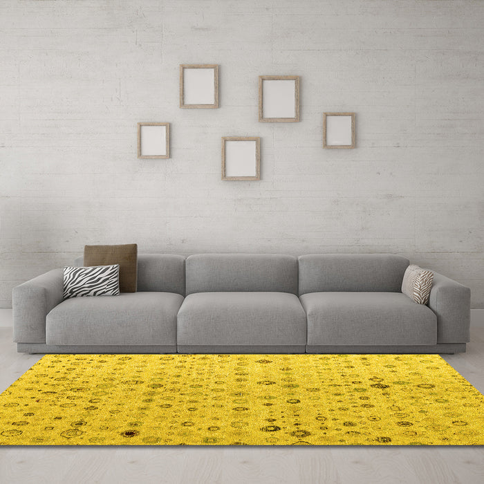 Machine Washable Solid Yellow Modern Rug in a Living Room, wshabs4478yw