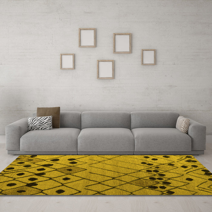 Machine Washable Solid Yellow Modern Rug in a Living Room, wshabs4481yw