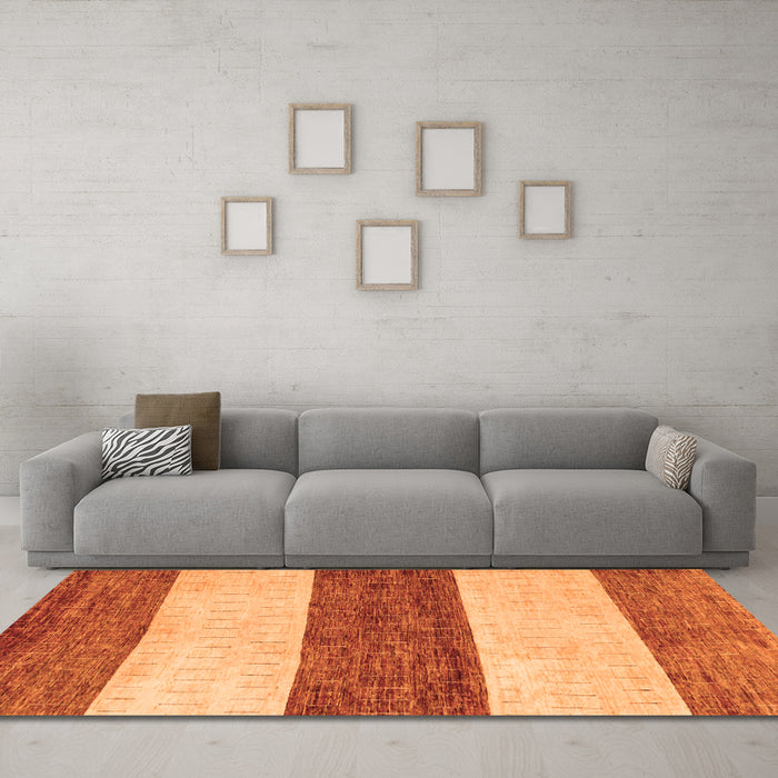 Machine Washable Abstract Orange Modern Area Rugs in a Living Room, wshabs44org