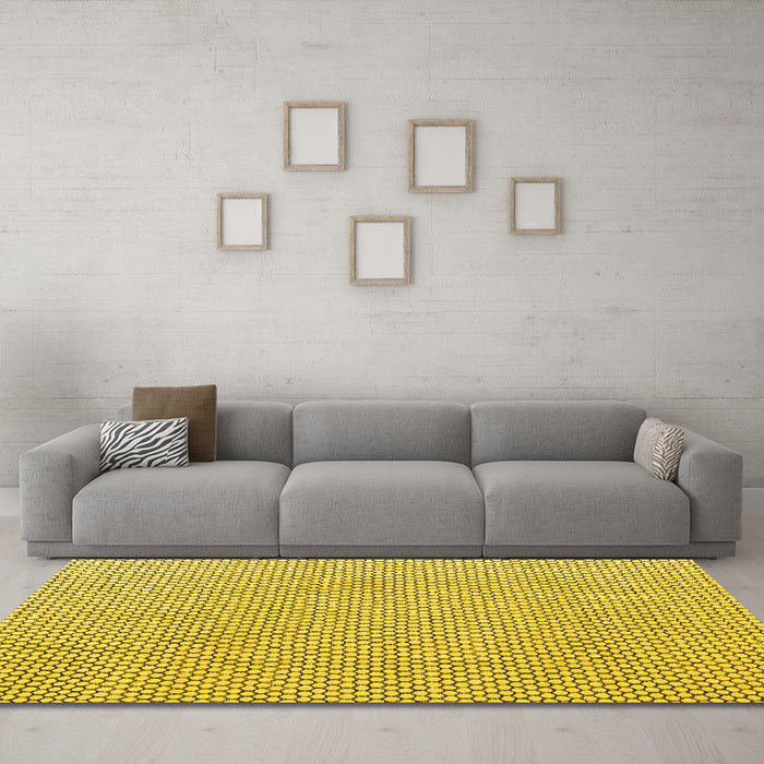Machine Washable Solid Yellow Modern Rug in a Living Room, wshabs4529yw