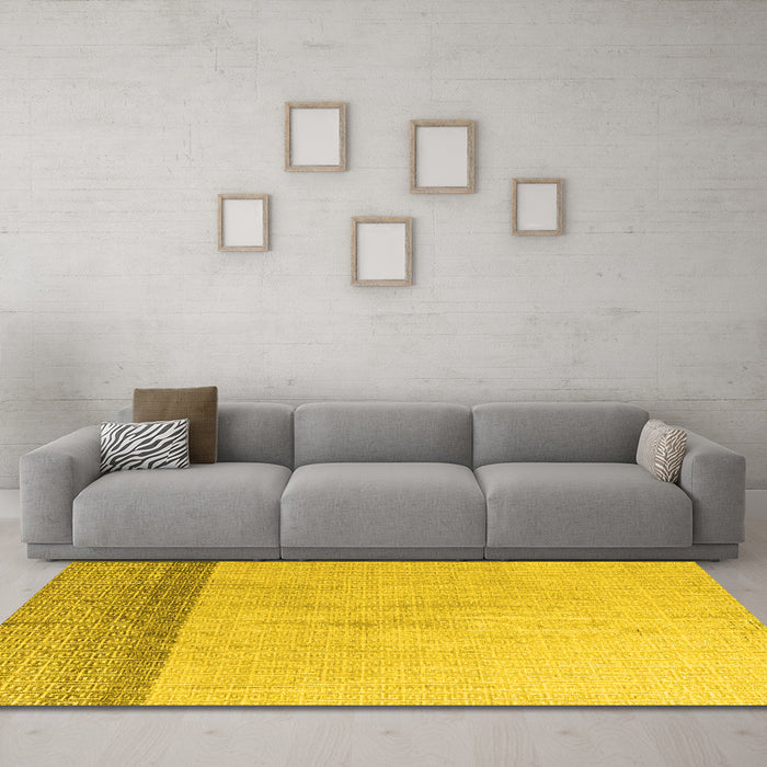 Machine Washable Solid Yellow Modern Rug in a Living Room, wshabs4547yw