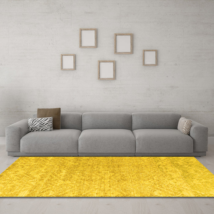 Machine Washable Solid Yellow Modern Rug in a Living Room, wshabs4549yw