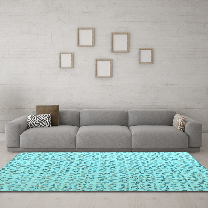 Machine Washable Solid Light Blue Modern Rug in a Living Room, wshabs4572lblu