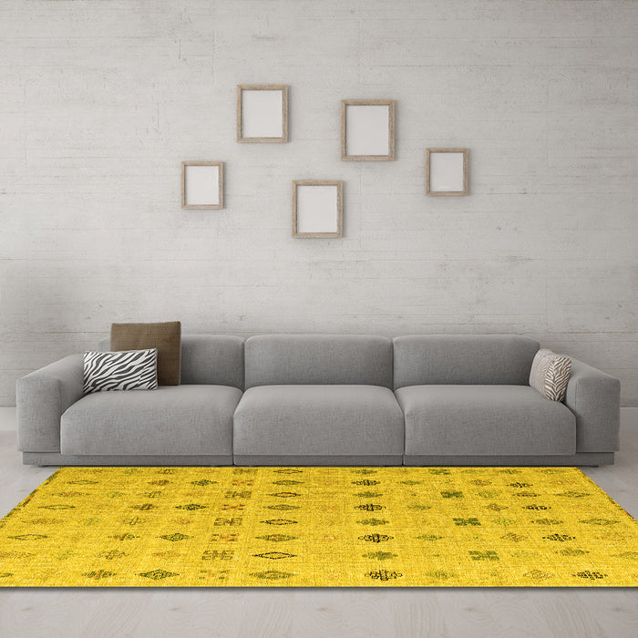 Machine Washable Solid Yellow Modern Rug in a Living Room, wshabs4639yw