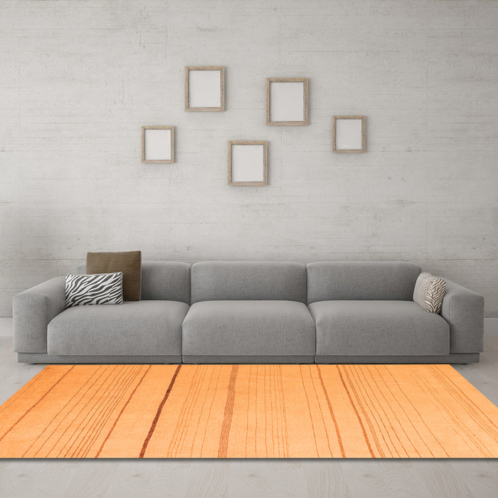 Machine Washable Solid Orange Modern Area Rugs in a Living Room, wshabs4669org