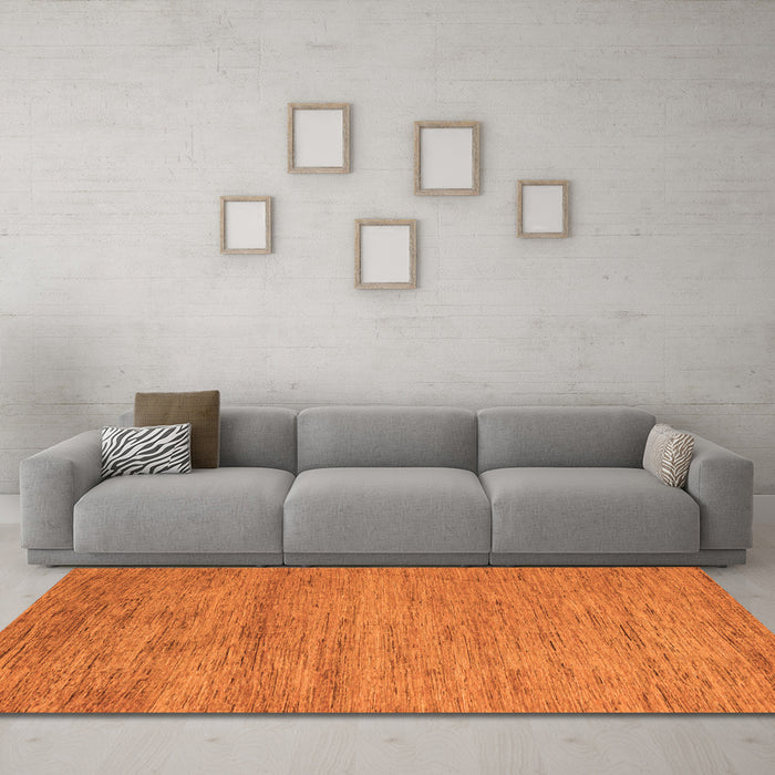 Machine Washable Abstract Orange Modern Area Rugs in a Living Room, wshabs4678org