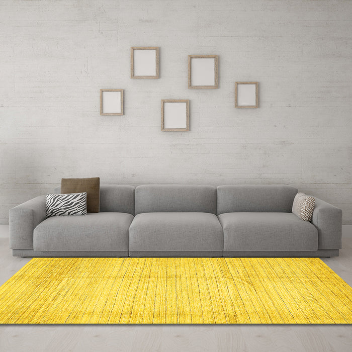 Machine Washable Solid Yellow Modern Rug in a Living Room, wshabs467yw