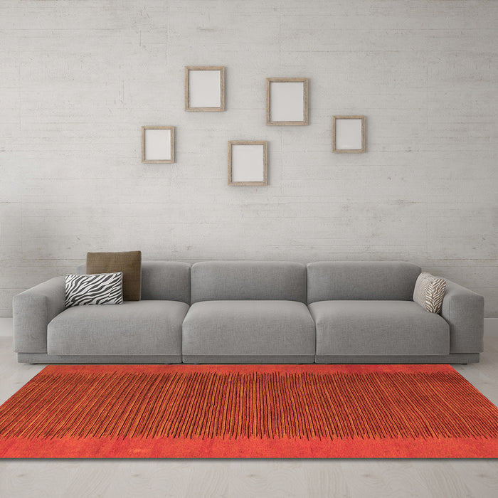Machine Washable Abstract Orange Modern Area Rugs in a Living Room, wshabs4680org