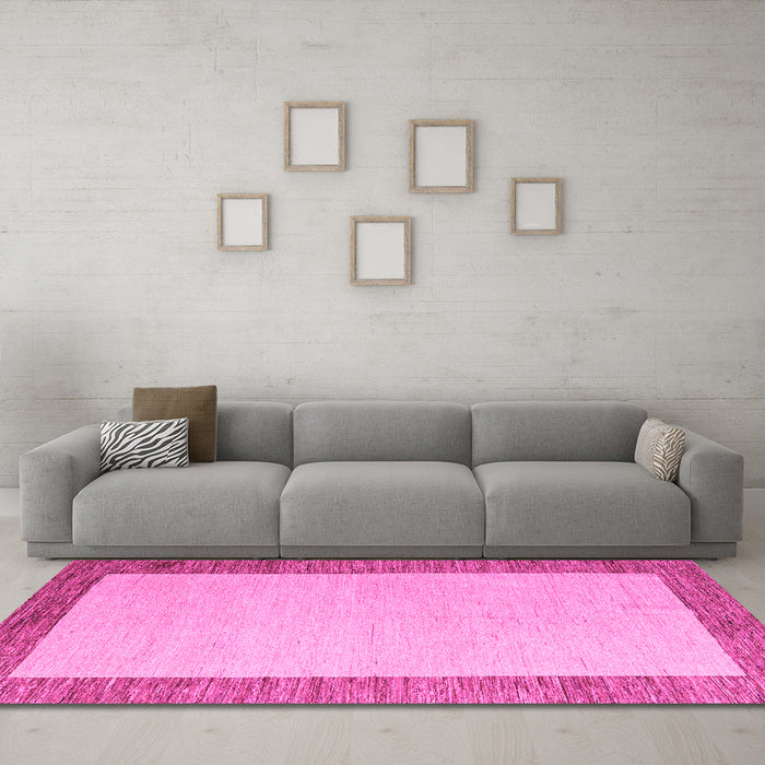 Machine Washable Solid Pink Modern Rug in a Living Room, wshabs4685pnk