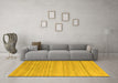 Machine Washable Solid Yellow Modern Rug in a Living Room, wshabs4695yw