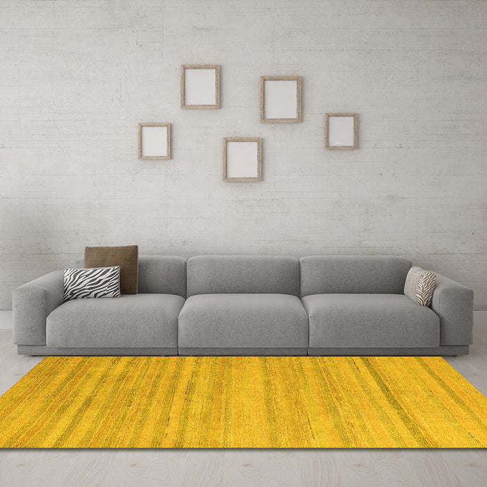 Machine Washable Solid Yellow Modern Rug in a Living Room, wshabs4695yw