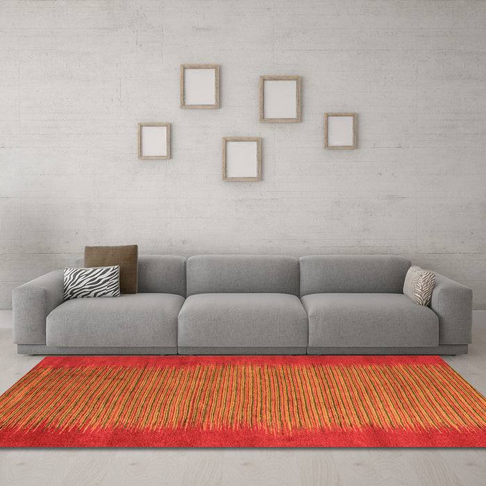 Machine Washable Abstract Orange Modern Area Rugs in a Living Room, wshabs4697org