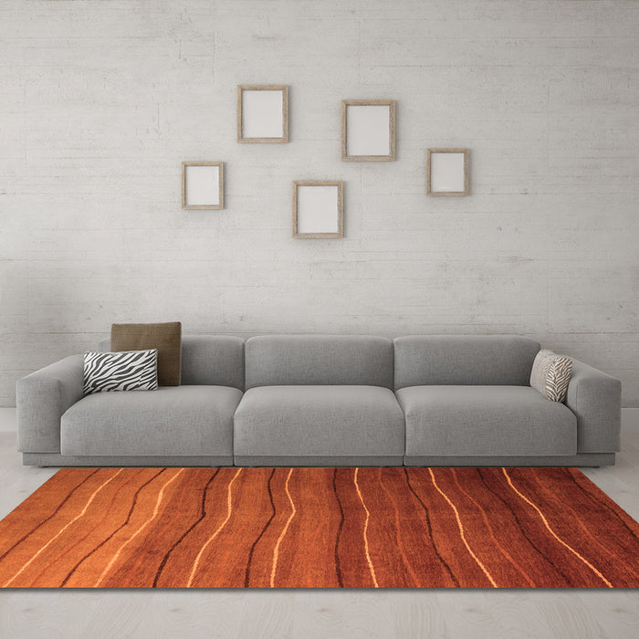 Machine Washable Abstract Orange Modern Area Rugs in a Living Room, wshabs4698org
