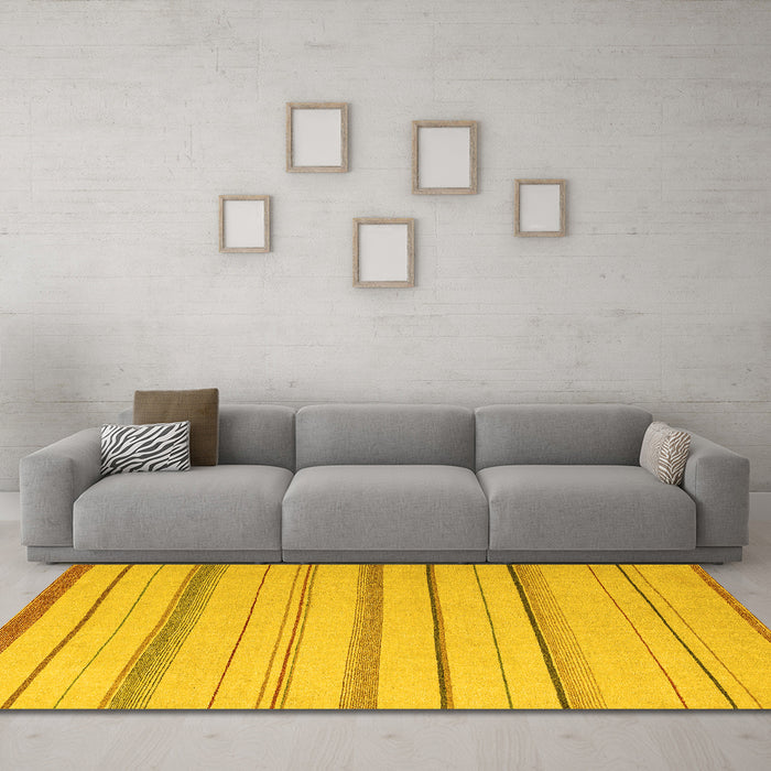 Machine Washable Solid Yellow Modern Rug in a Living Room, wshabs4700yw