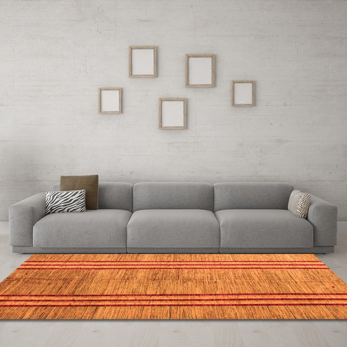 Machine Washable Abstract Orange Modern Area Rugs in a Living Room, wshabs4718org