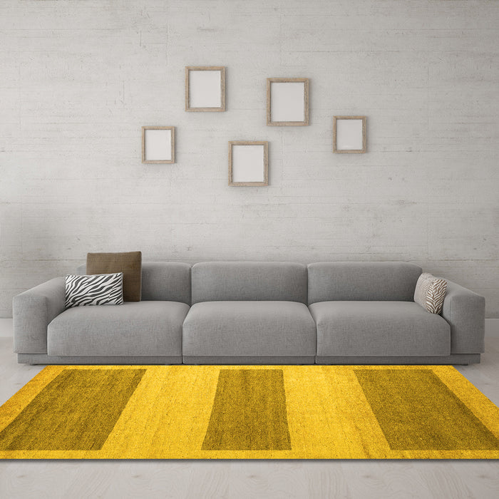 Machine Washable Solid Yellow Modern Rug in a Living Room, wshabs4719yw