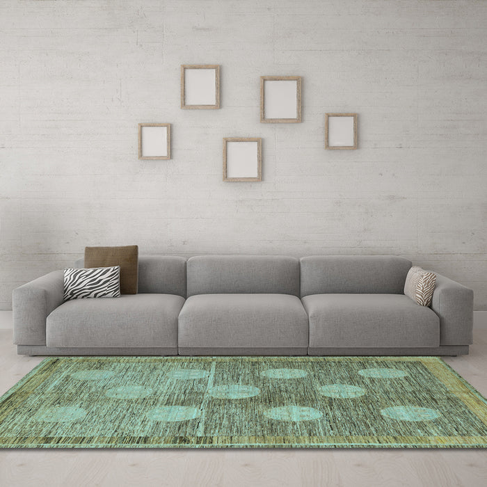 Machine Washable Oriental Light Blue Modern Rug in a Living Room, wshabs4724lblu