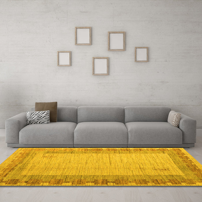 Machine Washable Abstract Yellow Modern Rug in a Living Room, wshabs4736yw