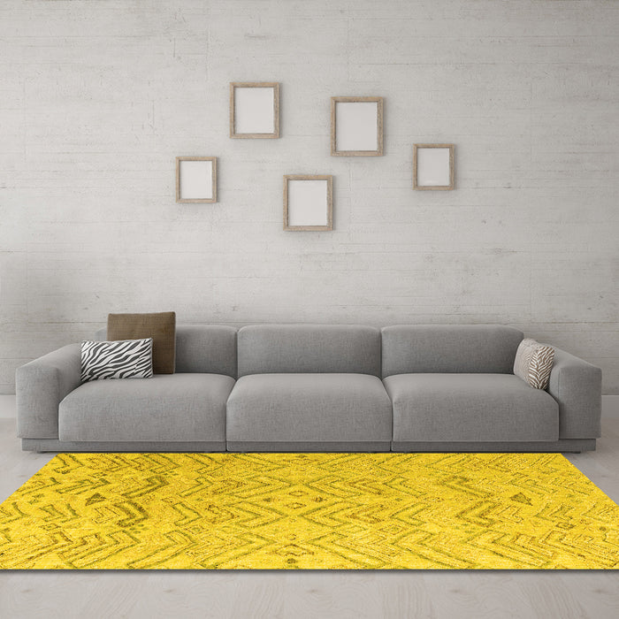 Machine Washable Solid Yellow Modern Rug in a Living Room, wshabs4746yw