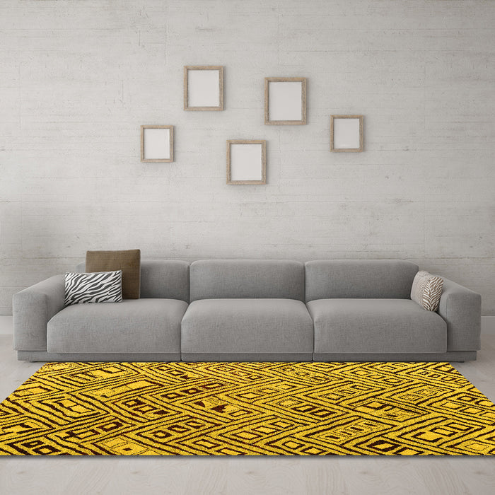 Machine Washable Solid Yellow Modern Rug in a Living Room, wshabs4751yw